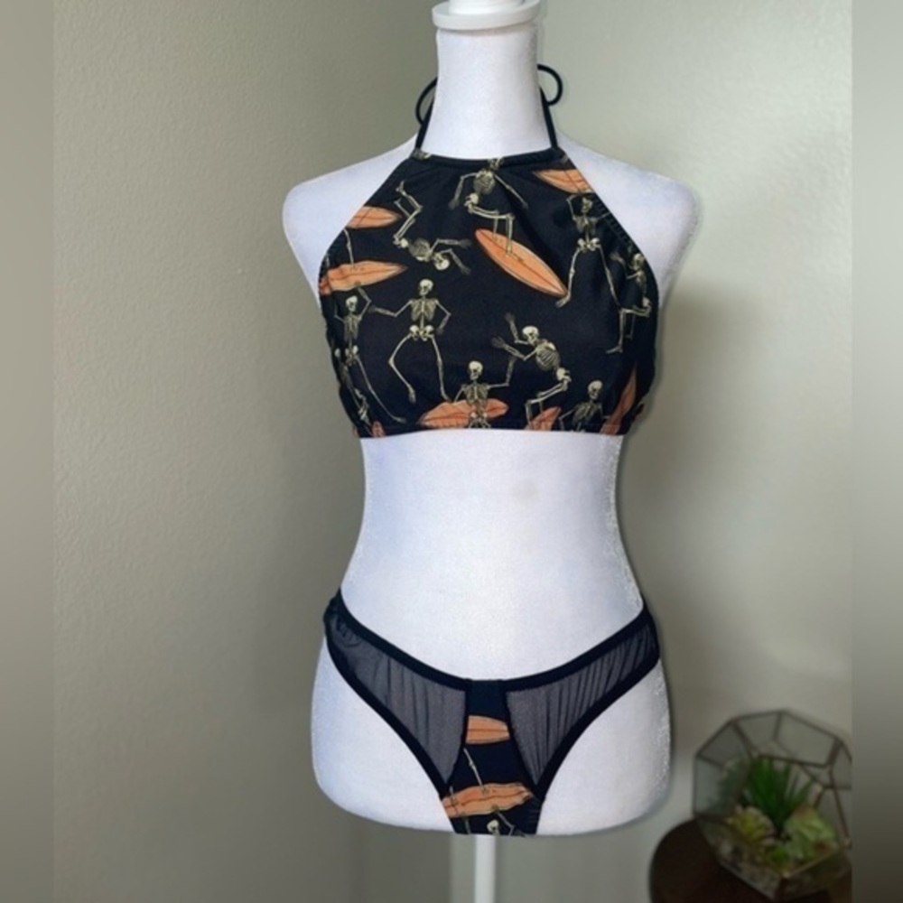 Moldie Goldies skeletons surfing bathing suit